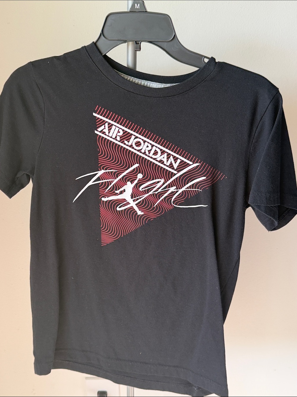 Jordan Black Tee with Red Triangle and White Script